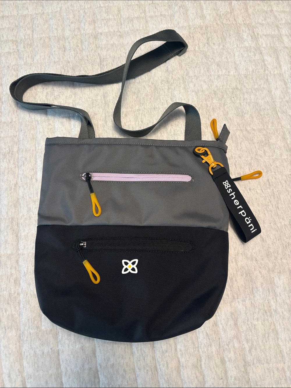 Sherpani Gray and Black Crossbody with Yellow Accent Pulls